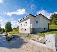 A family house in the Skalica environment, located next to the road amidst greenery.