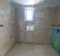 There are conduits on the wall, the room is under construction, it connects the family house.
