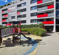 Residential complex on Malokrasňanská Street in Bratislava - Krasňany with a playground and greenery.