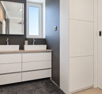 Bathroom with a sink, mirror, and storage space in a 3-room apartment.