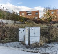 Electric meter cabinets and buildings in the background on Lopúchova Street in Bratislava - Nové Mesto, Land - residential.