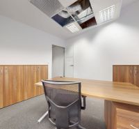Offices with wooden decor furniture and a metal chair.