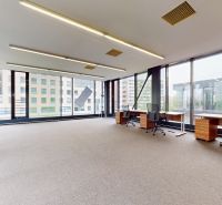 Spacious offices with large windows, desks, and chairs. Košická, Bratislava - Ružinov.