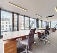 Offices with large windows, carpet, and work desks on Košická in Bratislava - Ružinov.