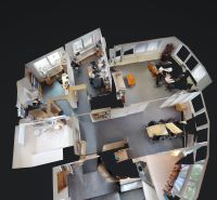 Office interiors with office furniture, computers, and ergonomic chairs.