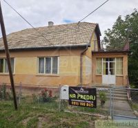 A family house in Sečianky, single-story with a gable roof and a garden. For sale.