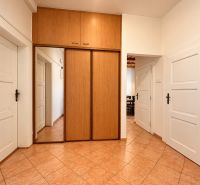 2-room apartment with tiles, a built-in wardrobe, and white doors.