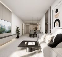 Bright living room in a two-room apartment with a wooden decor floor.