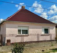 A family house on Cintorínska Street in Dulovce with a red roof and fence.