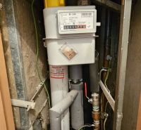 A measuring device for measuring gas consumption in the space of a one-room apartment.