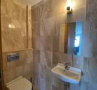Bathroom on Hlboká Street with a toilet and sink in a 3-room apartment.