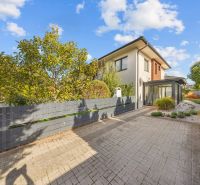 Two-story house on Mihály Marczell Street in Dunajská Streda with a landscaped garden.