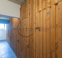 Wooden basement spaces in the interior of a 3-room apartment.