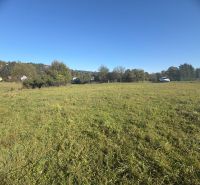 Green meadows in Podvysoká for residential plots with views of the surrounding landscape.