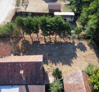 A family house on St. Florian Square in Krakovany with a large yard and greenery.