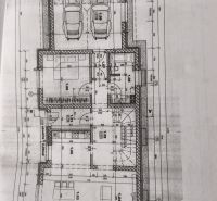 Floor plan of a family house in Zlaté Moravce with a double garage and multiple rooms.