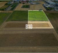 Aerial view of properties - housing in Nové Zámky surrounded by agricultural landscape.