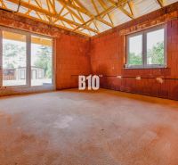 An unfinished room in a family house with a view outside in Čeľadice.