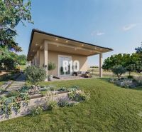 A family house in Čeľadice surrounded by a garden with a terrace and greenery.