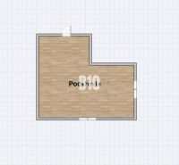 Attic with wooden decor flooring in a family house, L-shaped room.