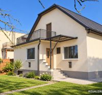 A family house on Družstevná Street in Dubnica nad Váhom surrounded by a well-maintained garden.