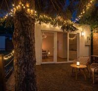 Terrace on Recreational Grounds with furniture and lights in Bratislava - Devín on Devínska Road.