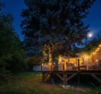 Evening lighting on the terrace among the trees, Recreational plots, Bratislava - Devín, Devínska cesta.