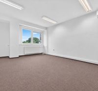 Offices with a large window and white walls, ideally on Brnianska Street in Trenčín.