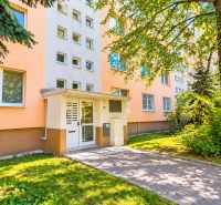 Apartment building on Rumančekova Street in Bratislava - Ružinov, surrounded by greenery.