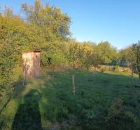 Gardens at Tatranská 201 in Zlaté Moravce with a wooden shelter surrounded by trees.