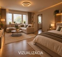 Elegant living room with comfortable furniture and wood-patterned flooring.