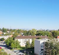 View of a residential area and greenery, Trnava, from a height, suitable for a 3-room apartment.