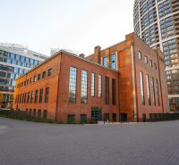The exterior of Čulenova in Bratislava - Staré Mesto with brick buildings and modern architecture.