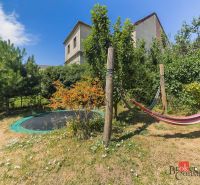 Garden with a trampoline and a hammock on Čajakova Street in Bratislava-Nové Mesto.