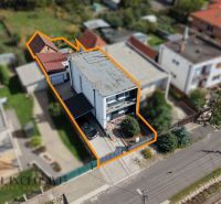 A family house in Trstice in an aerial photograph, with marked property boundaries.