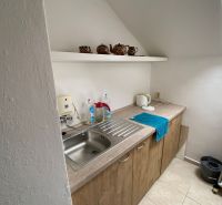 Kitchen unit with a stainless steel sink and a shelf for dishes, Offices.