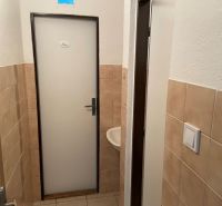 Door to the toilet with the sign 