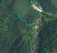 Aerial view of land plots in the Oščadnica area with visible parcels and roads.
