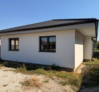 A family house on Hlavná Street in Preseľany with a white facade and a sloped roof.