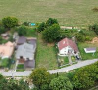 Aerial view of plots - housing in Medzianky, surrounding houses and nature.