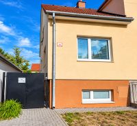 A family house on Kupeckého Street in Piešťany with a fenced yard and an entrance gate.