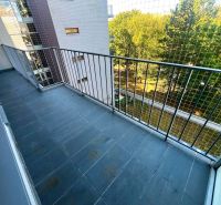 Balcony in a 3-room apartment on Obrody Street, Košice - West district, with a view of greenery.