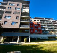 Apartment building on Obrody Street in Košice - Západ district, with balconies and greenery.