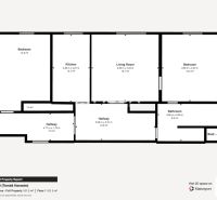 Floor plan of a 3-room apartment with a kitchen, living room, and two bedrooms.