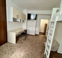 A room with a desk and a bunk bed in a 3-room apartment.