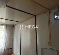 Interior with a curtain on the window and a fan, suitable for garden spaces.