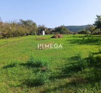 Green residential plots in Humenné with a view of the hilly landscape in Humenné.