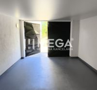 A spacious room with open doors, entrance from a 4-room apartment, light wall.