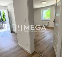 A hallway in a 4-room apartment with a wooden decor floor and lighting.