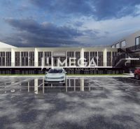 Commercial premises on Poľná Street in Humenné with a parking lot in front of the building.